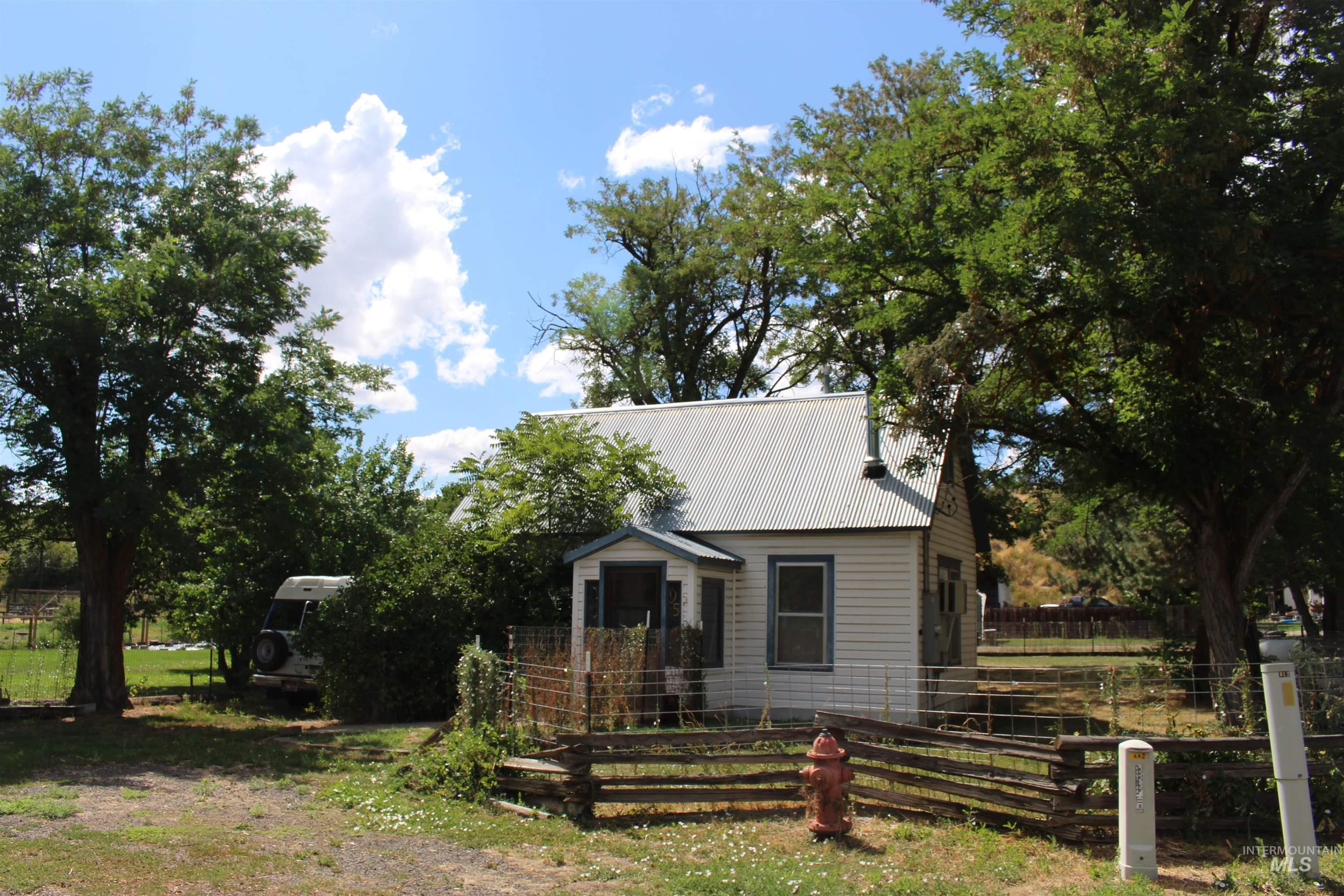 View of front facade with a metal roof