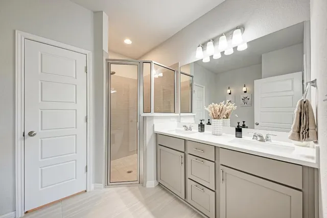 a view of staircase with white walls and a window