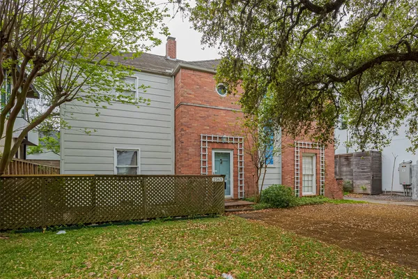 a view of a house with a garden