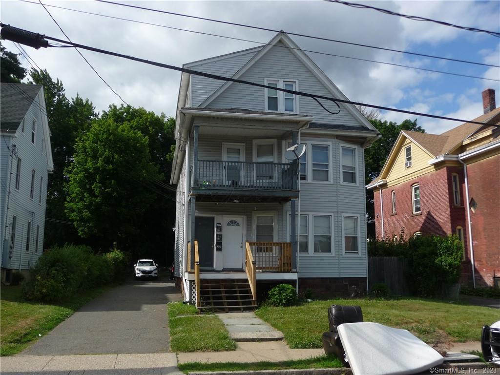 24 King Street, Unit 3 Hartford, CT 06114 - Photo 1 of 1 a front view of a house with garden