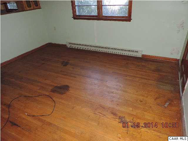 669 Lawyers Road Red House, VA 23963 - Photo 13 of 24 a view of a room with wooden floor and a window