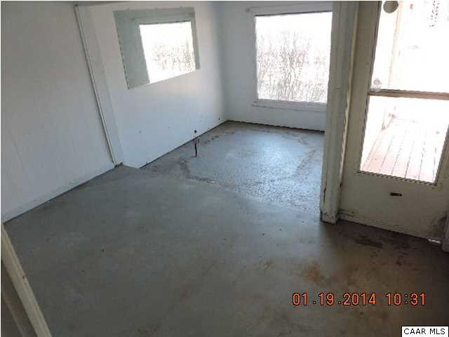 669 Lawyers Road Red House, VA 23963 - Photo 18 of 24 an empty room with windows