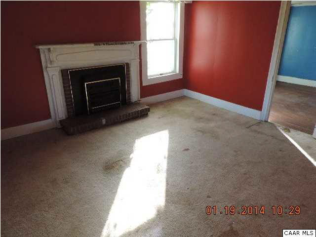 669 Lawyers Road Red House, VA 23963 - Photo 5 of 24 a view of empty room with a fireplace