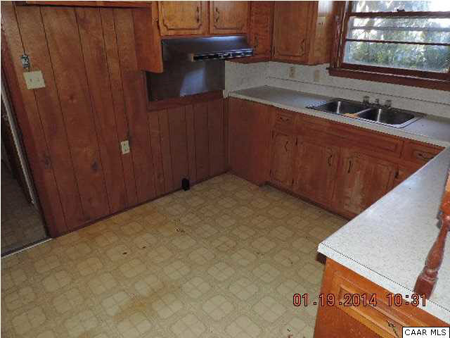 669 Lawyers Road Red House, VA 23963 - Photo 9 of 24 a kitchen with a sink and cabinets