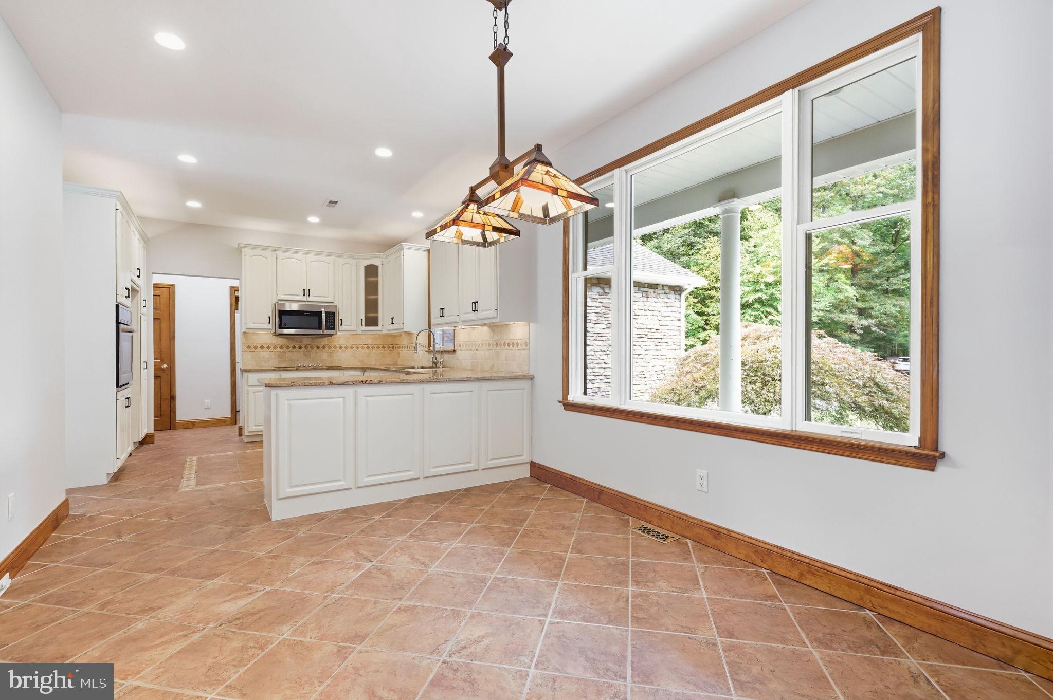 1669 Fennel Road Quakertown, PA 18951 - Photo 12 of 68 Bright breakfast area with front of home view