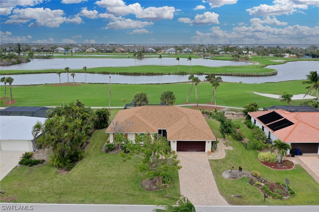 1113 Sand Castle Road Sanibel, FL 33957 - Photo 1 of 50 an aerial view of a house with big garden