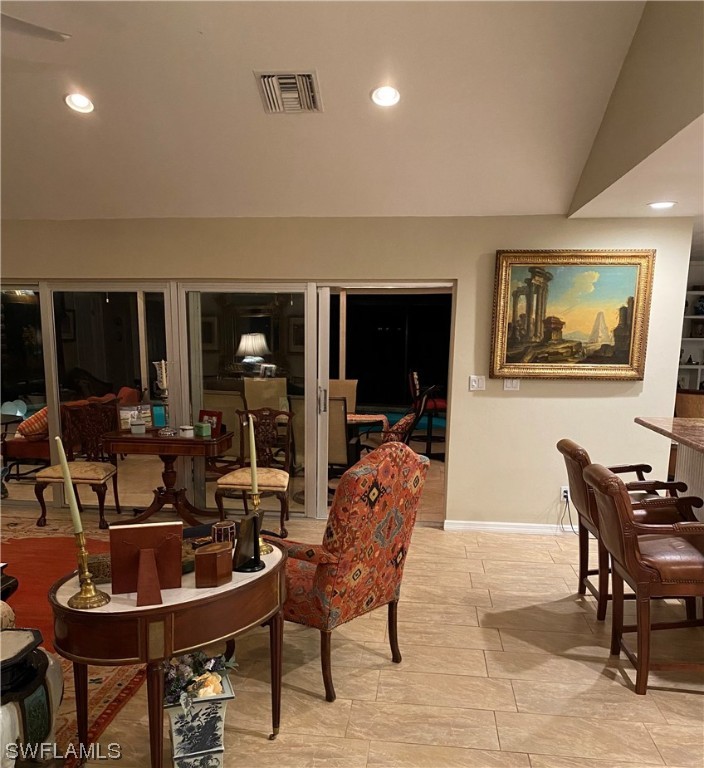 1113 Sand Castle Road Sanibel, FL 33957 - Photo 17 of 50 a living room with furniture and a large window