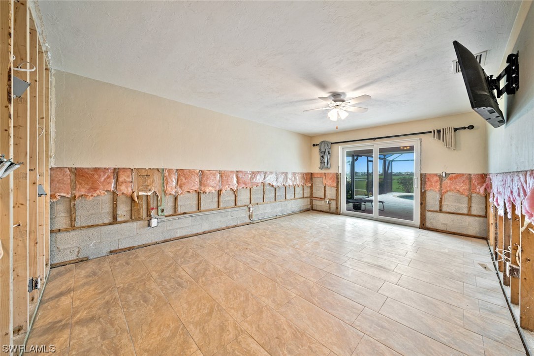 1113 Sand Castle Road Sanibel, FL 33957 - Photo 29 of 50 a view of an empty room with a fireplace