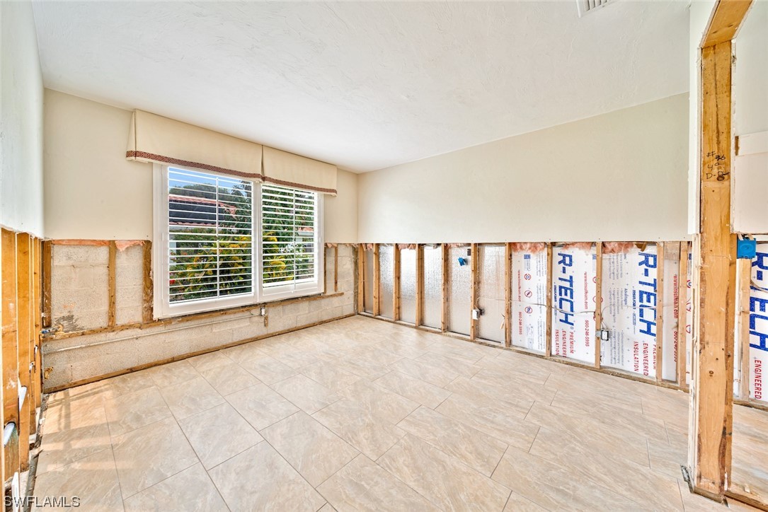 1113 Sand Castle Road Sanibel, FL 33957 - Photo 41 of 50 a view of an empty room with a window