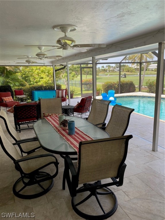 1113 Sand Castle Road Sanibel, FL 33957 - Photo 46 of 50 a living room with furniture and a large window