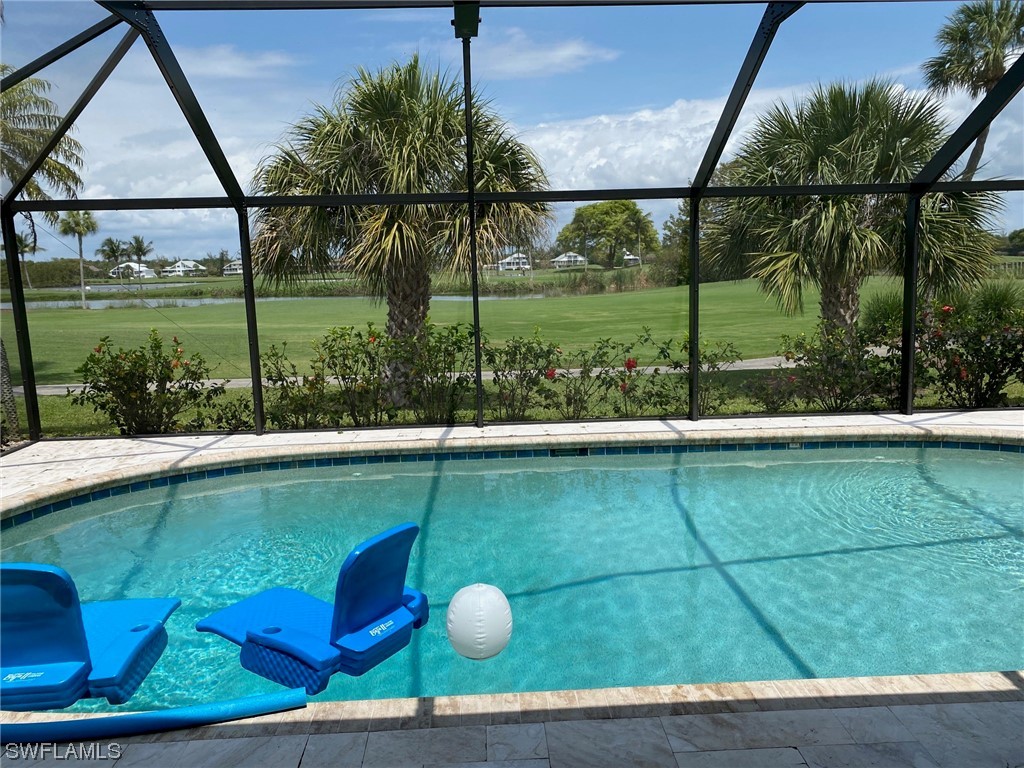 1113 Sand Castle Road Sanibel, FL 33957 - Photo 9 of 50 swimming pool view from a balcony