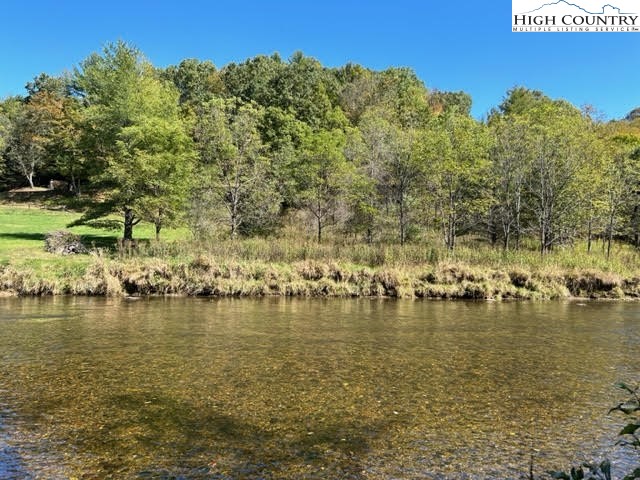 1147 River Hills Road Lansing, NC 28643 - Photo 6 of 31 a view of a lake with houses