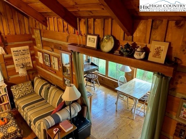 1147 River Hills Road Lansing, NC 28643 - Photo 10 of 31 a view of an chairs and table in the balcony