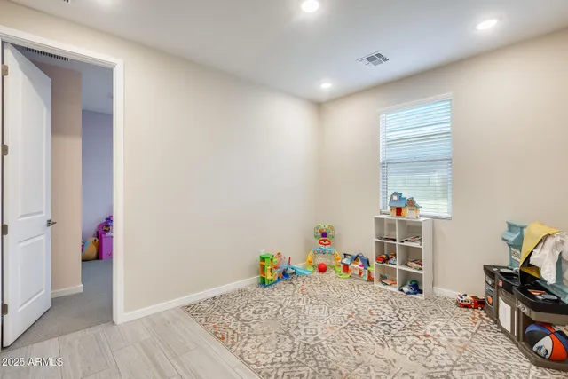 a view of a room with baby toys