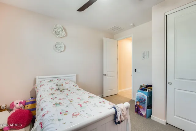 a aerial view of a house with swimming pool and furniture