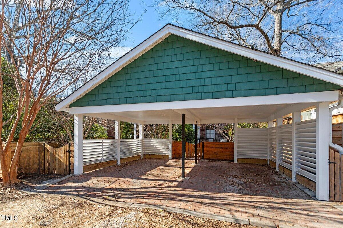 210 Woodburn Road Raleigh, NC 27605 - Photo 36 of 54 a view of a house with a yard
