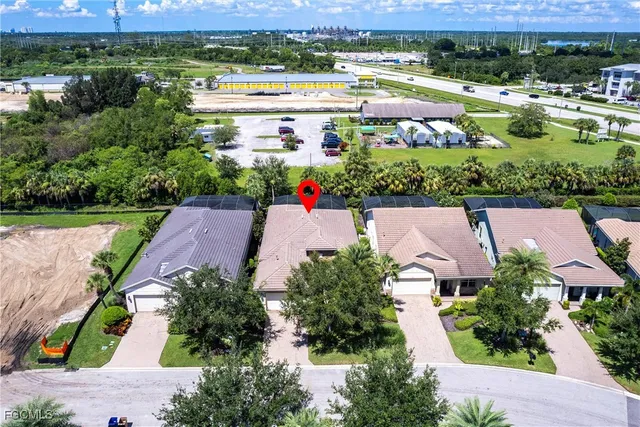an aerial view of a house with a garden