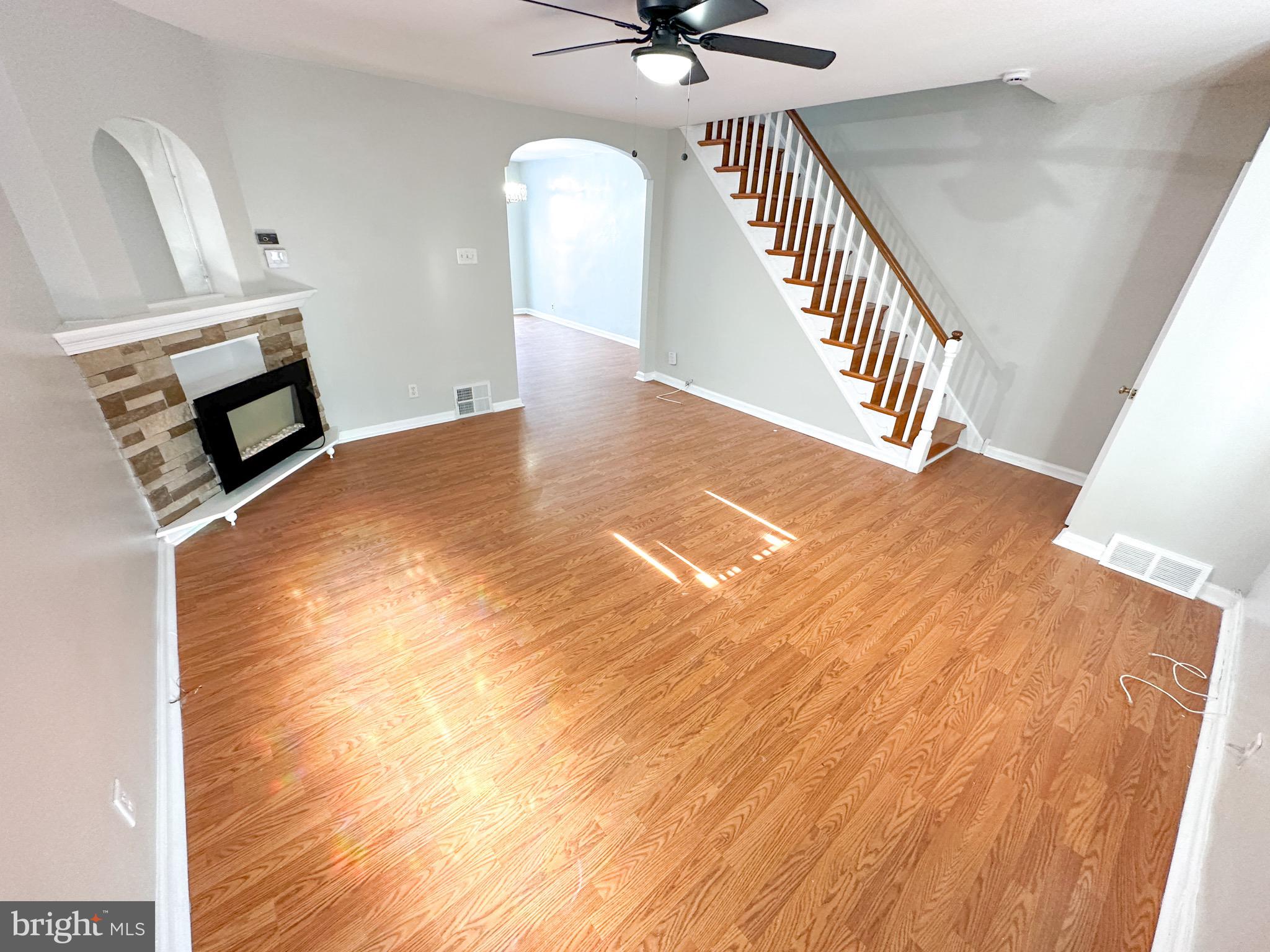 217 Stevens Street Philadelphia, PA 19111 - Photo 4 of 18 a view of a livingroom with wooden floor