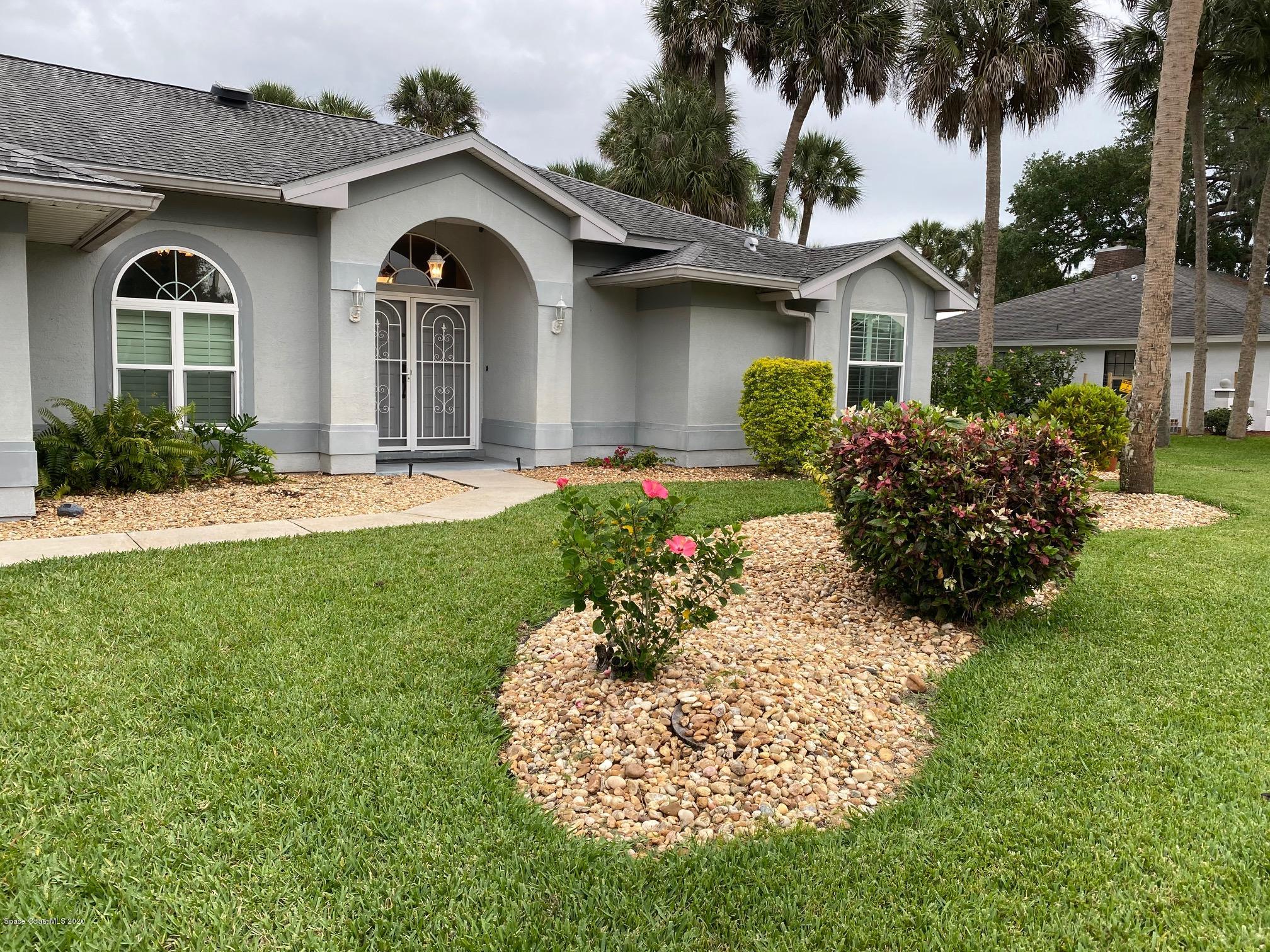 1191 Meadowbrook Road Northeast Palm Bay, FL 32905 - Photo 2 of 32 Front 2