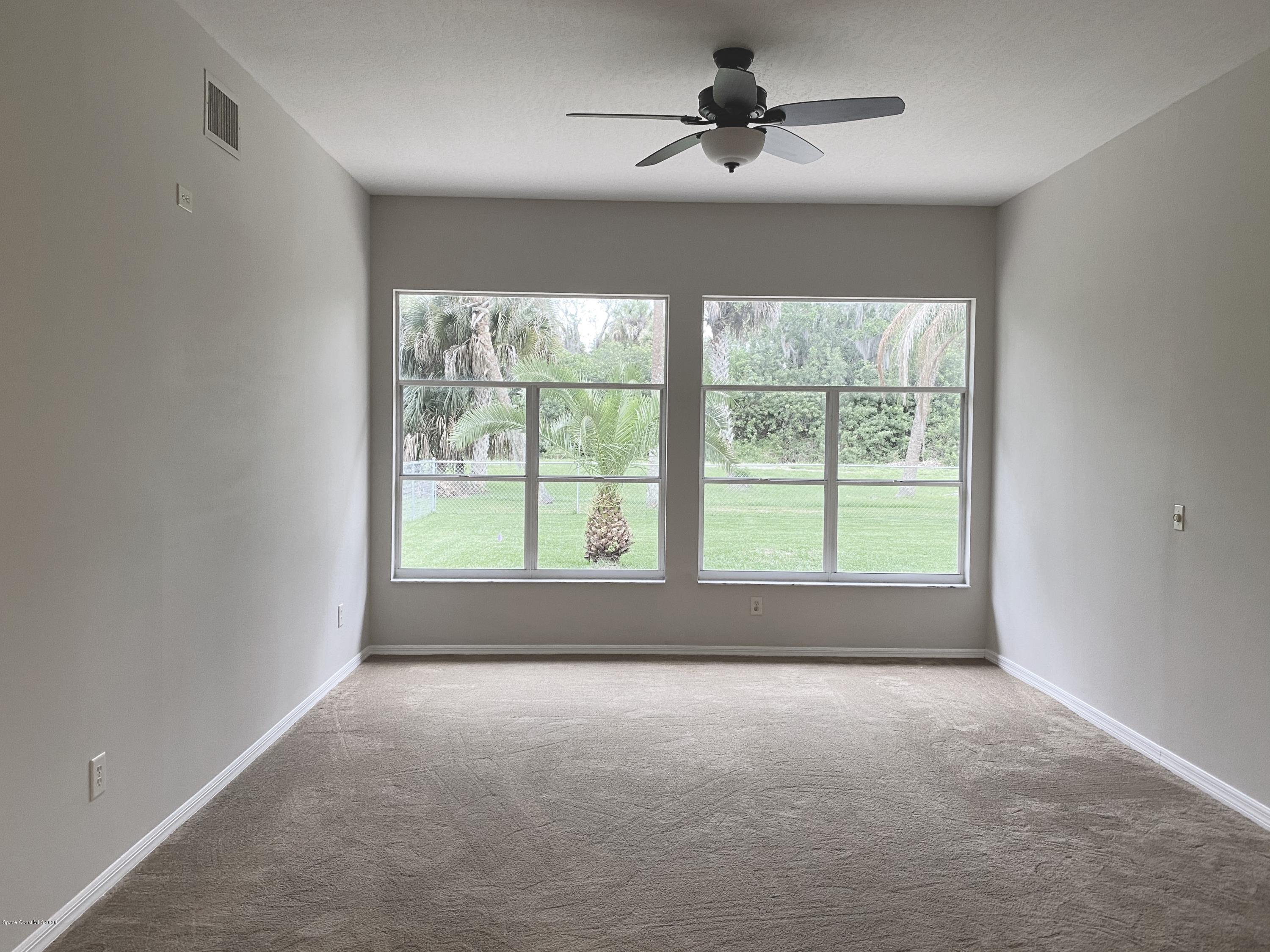 1191 Meadowbrook Road Northeast Palm Bay, FL 32905 - Photo 13 of 32 Family Room 2