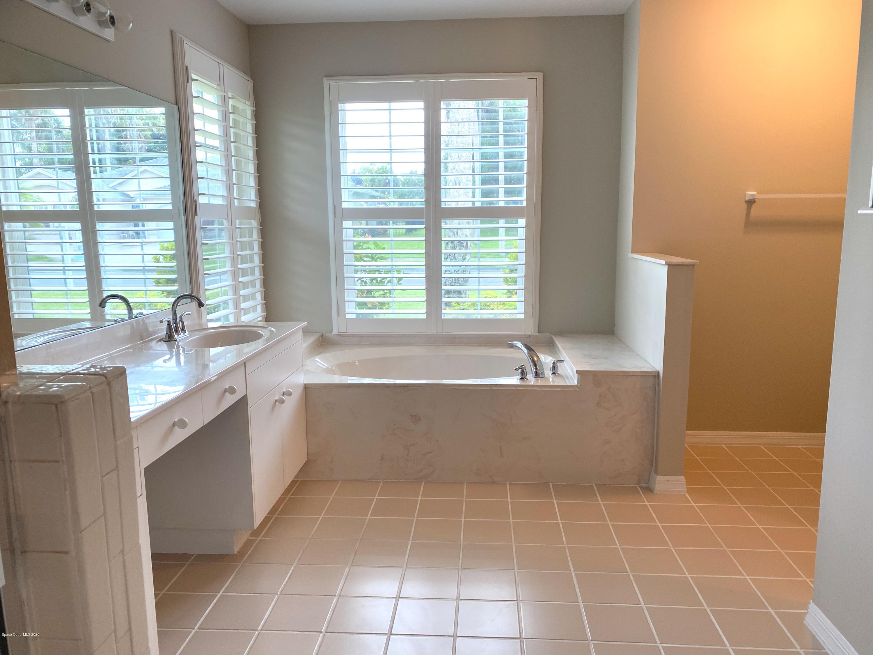 1191 Meadowbrook Road Northeast Palm Bay, FL 32905 - Photo 16 of 32 Master Bathroom