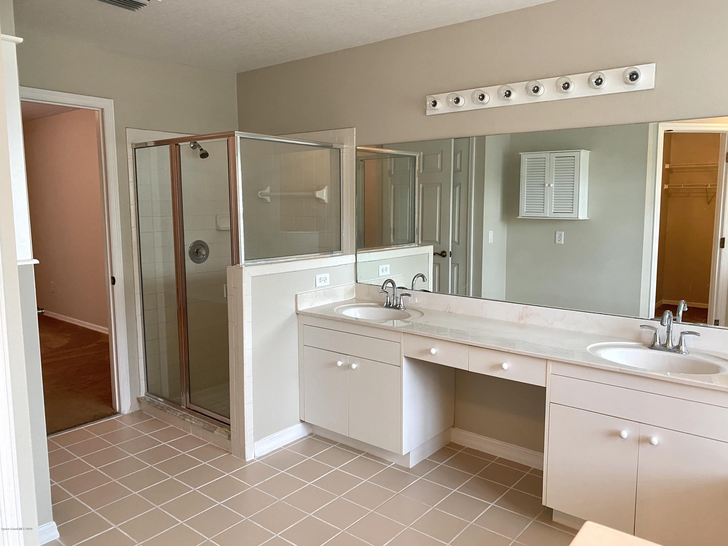 1191 Meadowbrook Road Northeast Palm Bay, FL 32905 - Photo 17 of 32 Master Bathroom 2