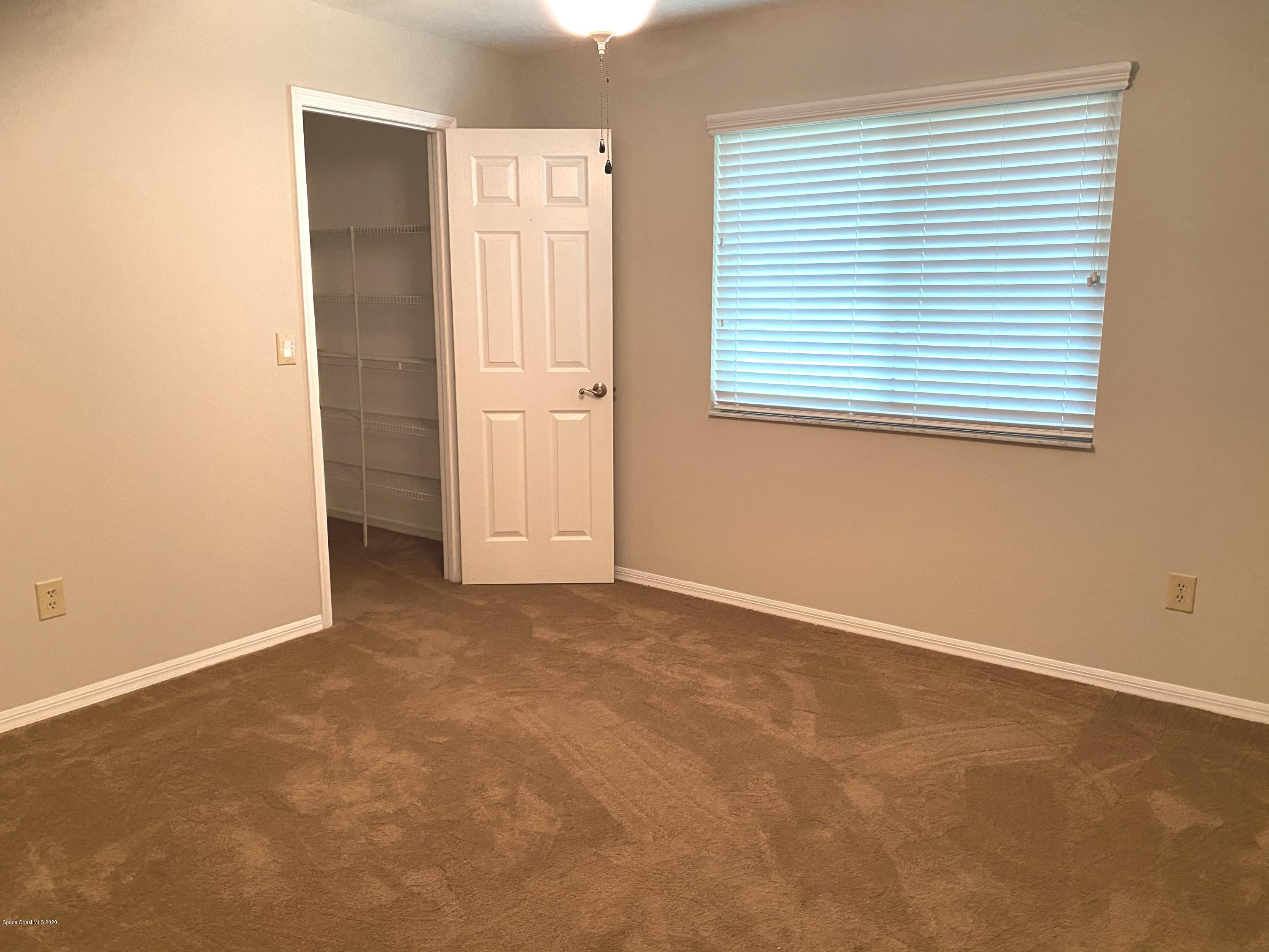 1191 Meadowbrook Road Northeast Palm Bay, FL 32905 - Photo 18 of 32 Guest Bedroom 2