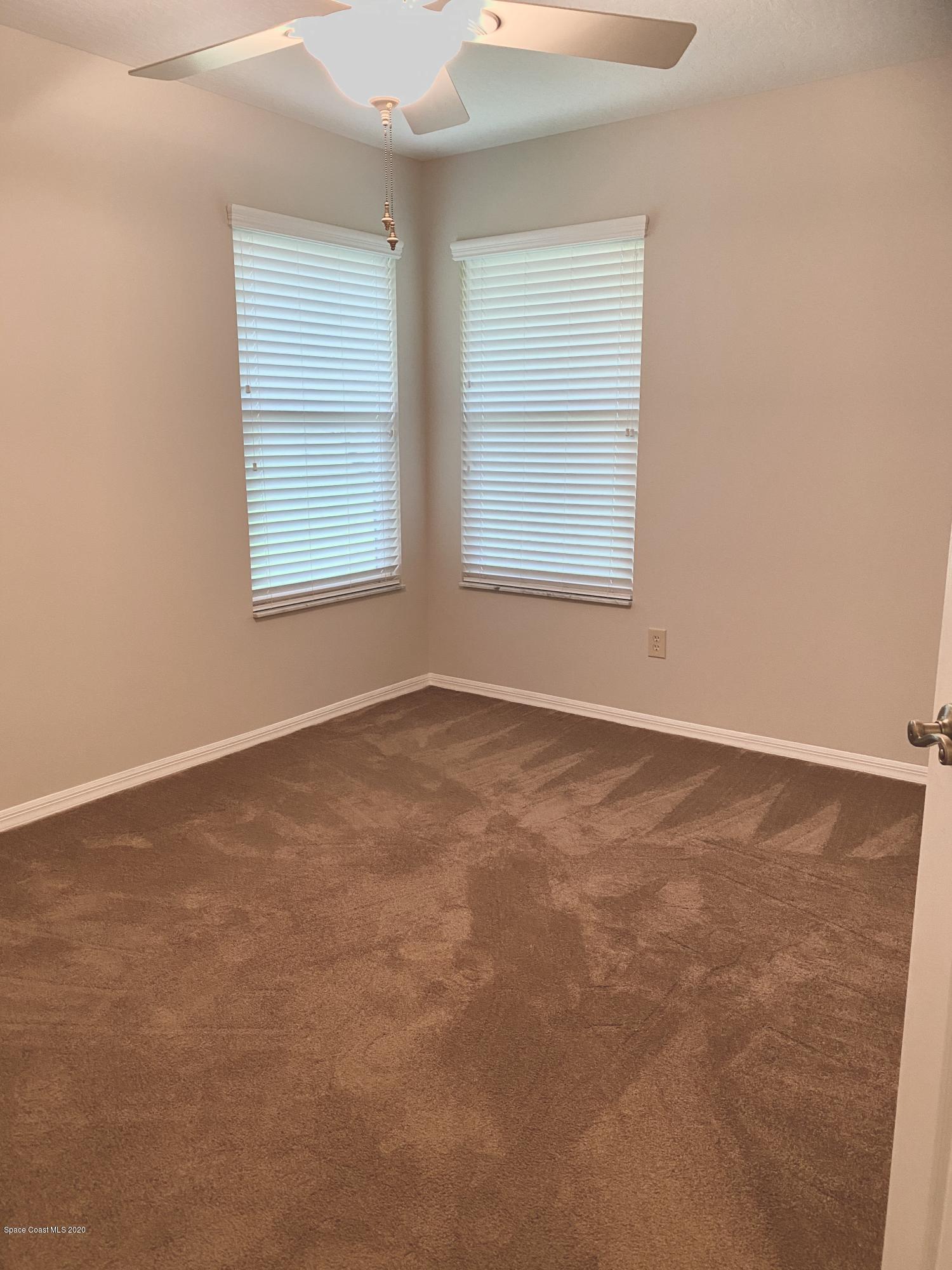 1191 Meadowbrook Road Northeast Palm Bay, FL 32905 - Photo 19 of 32 Guest Bedroom