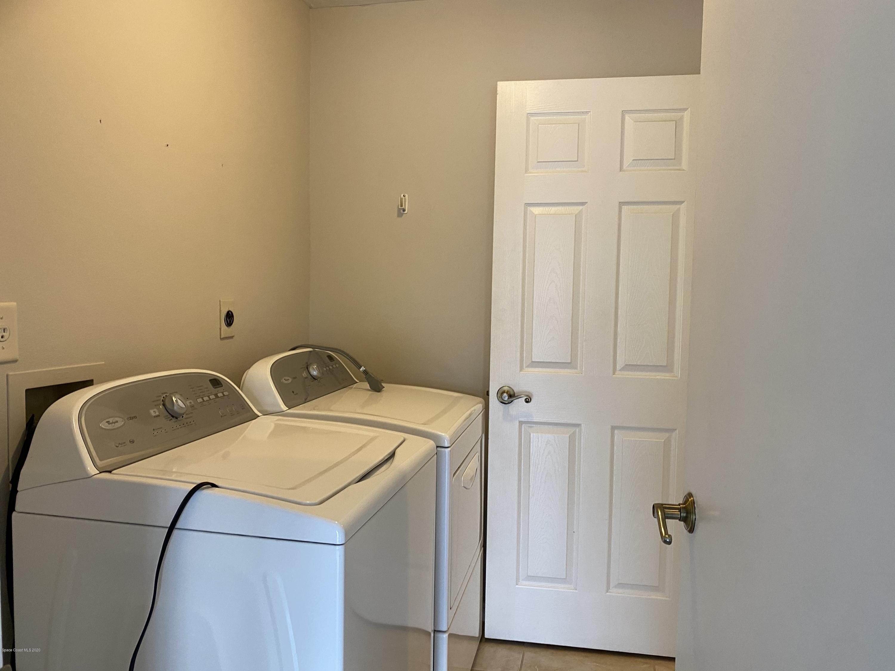 1191 Meadowbrook Road Northeast Palm Bay, FL 32905 - Photo 21 of 32 Laundry Room