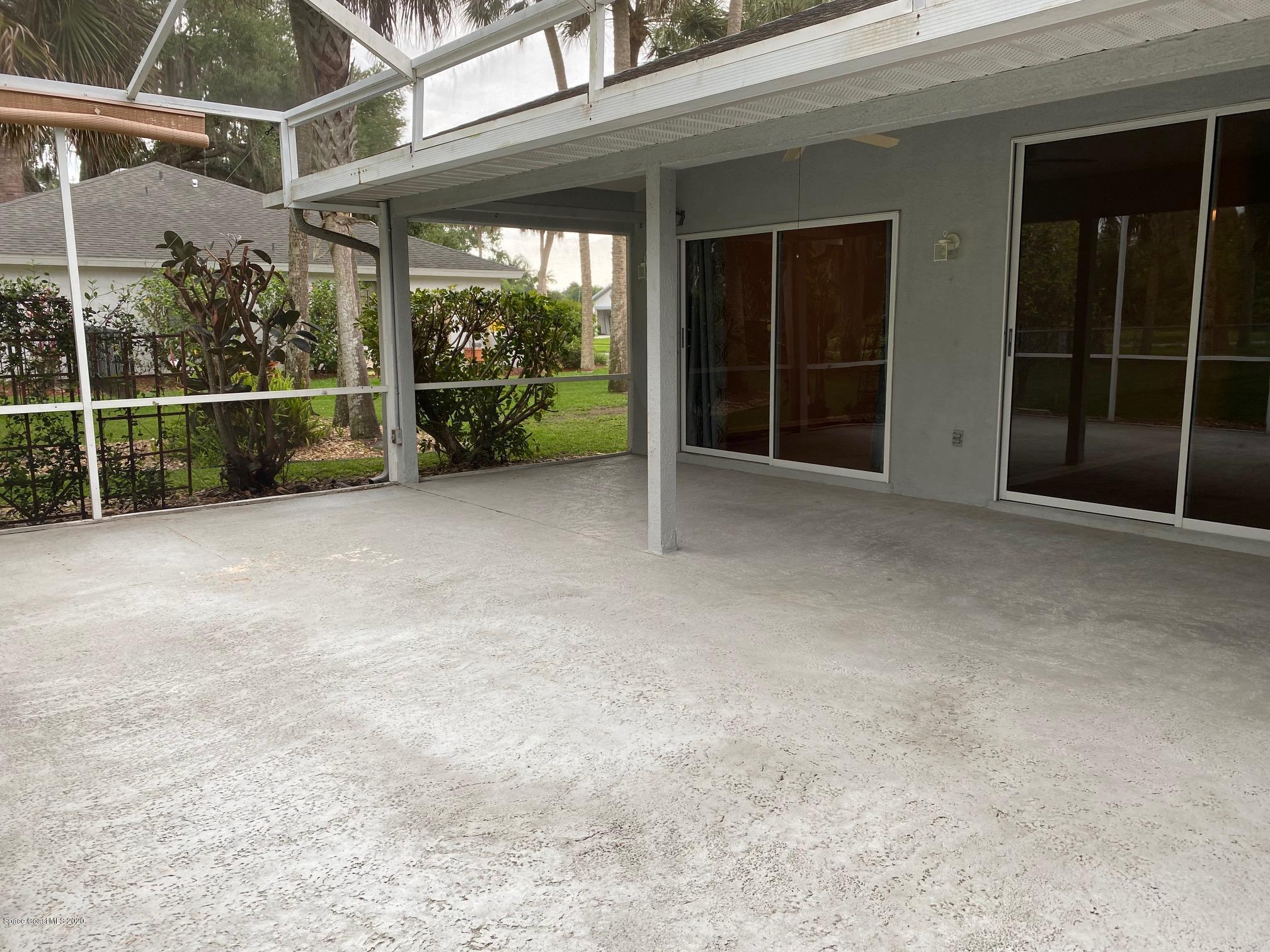 1191 Meadowbrook Road Northeast Palm Bay, FL 32905 - Photo 24 of 32 Back Porch