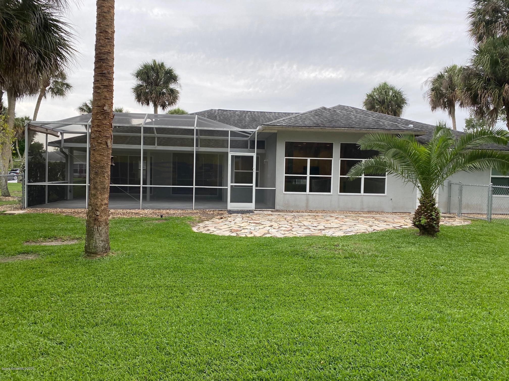 1191 Meadowbrook Road Northeast Palm Bay, FL 32905 - Photo 25 of 32 Back of home