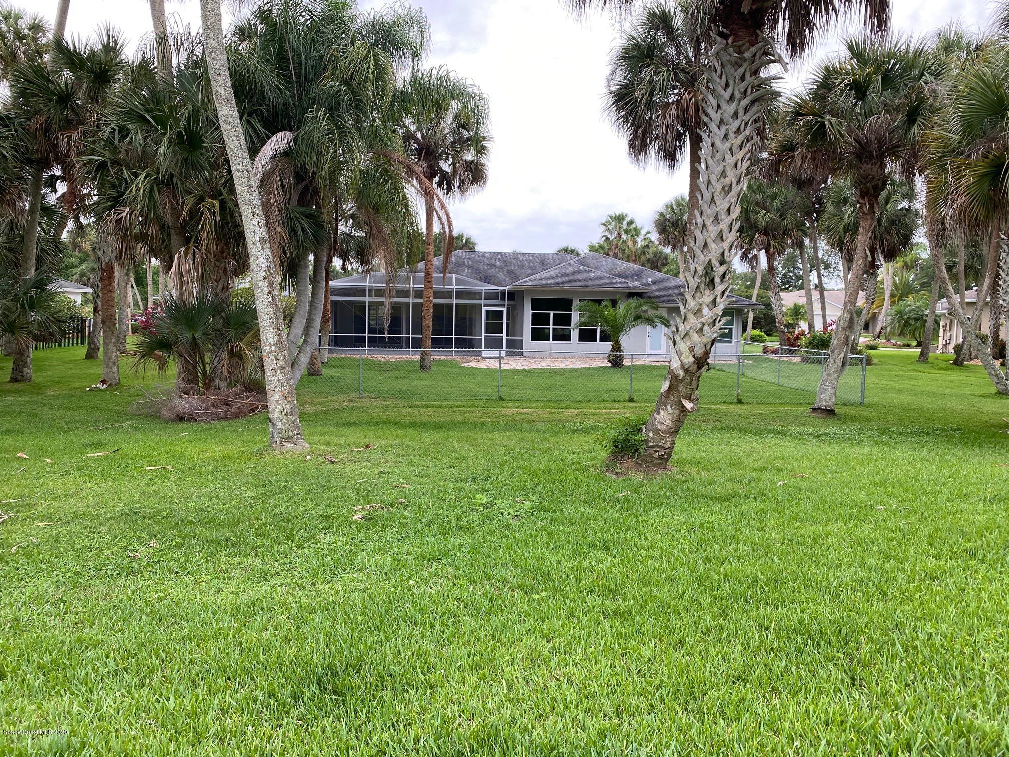 1191 Meadowbrook Road Northeast Palm Bay, FL 32905 - Photo 26 of 32 Back View of Home