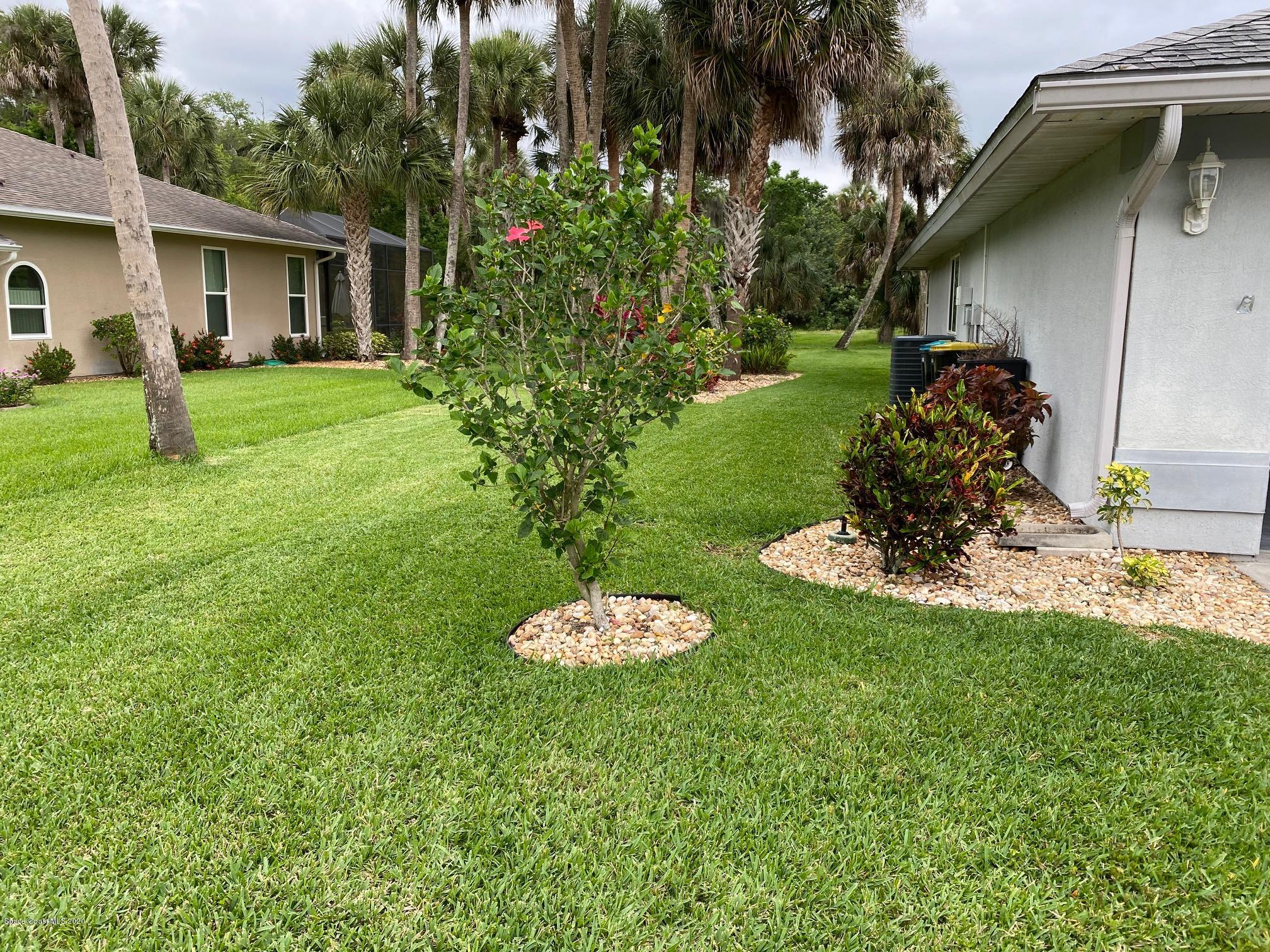 1191 Meadowbrook Road Northeast Palm Bay, FL 32905 - Photo 29 of 32 West side of Home 2