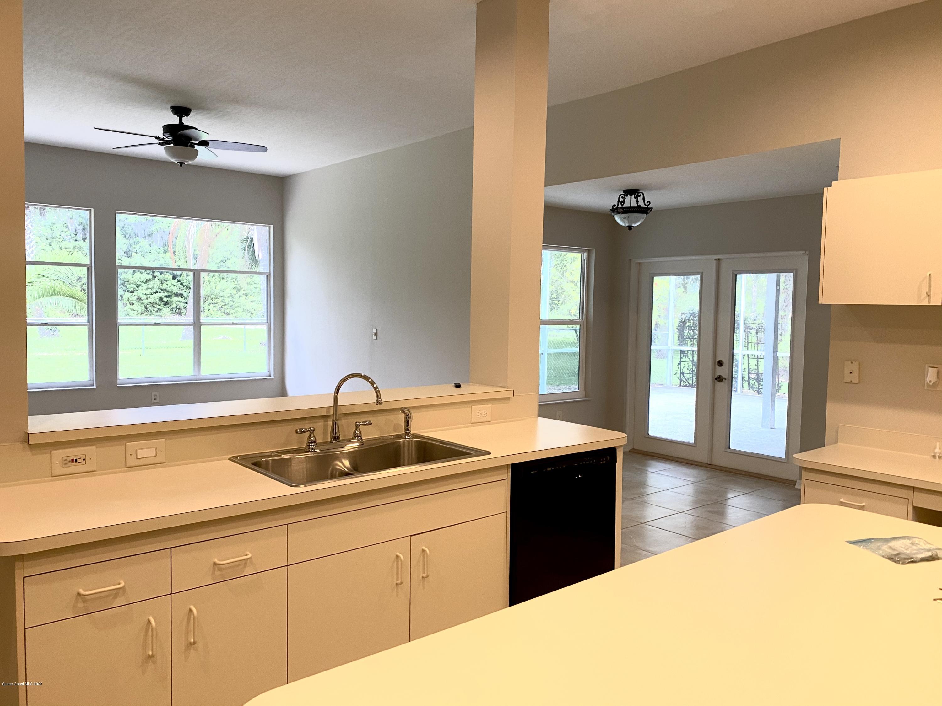 1191 Meadowbrook Road Northeast Palm Bay, FL 32905 - Photo 8 of 32 Kitchen 3