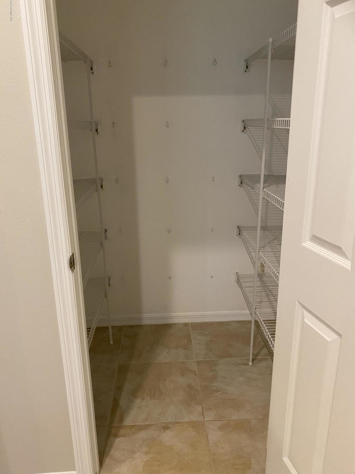 1191 Meadowbrook Road Northeast Palm Bay, FL 32905 - Photo 10 of 32 Walk In Pantry