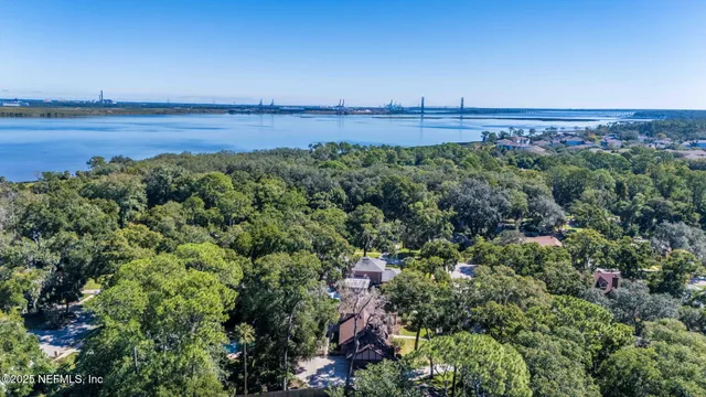 a kitchen with granite countertop cabinets stainless steel appliances and a sink