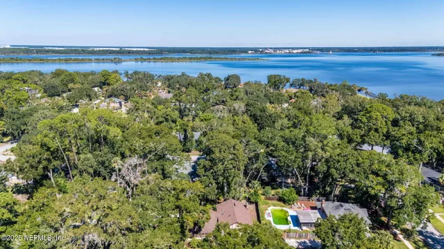 a kitchen with cabinets and stainless steel appliances
