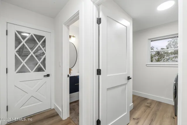 a white bath tub sitting in a bathroom