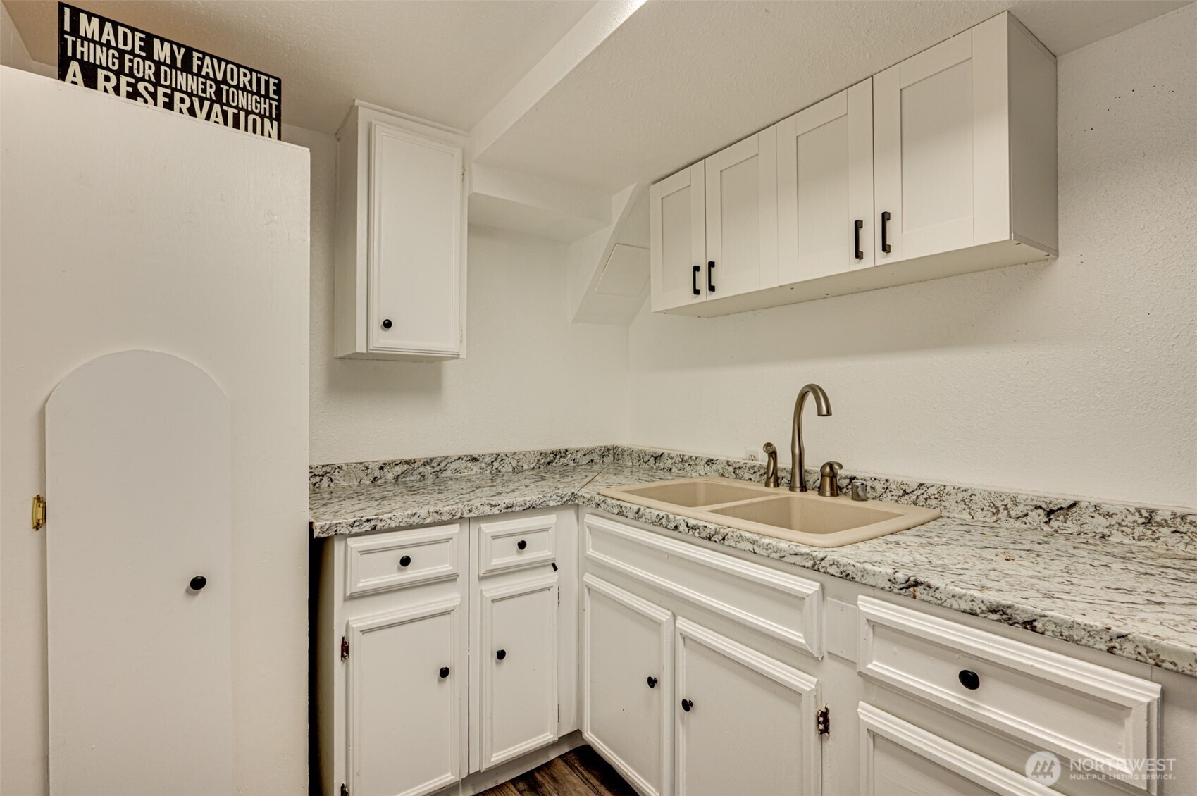 2126 Lewis River Road Woodland, WA 98674 - Photo 7 of 23 a kitchen with granite countertop white cabinets and a sink