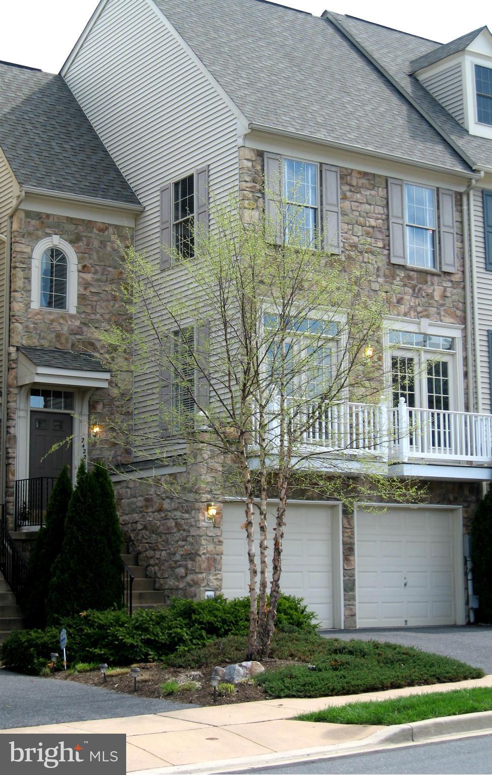 a view of a building with a garden