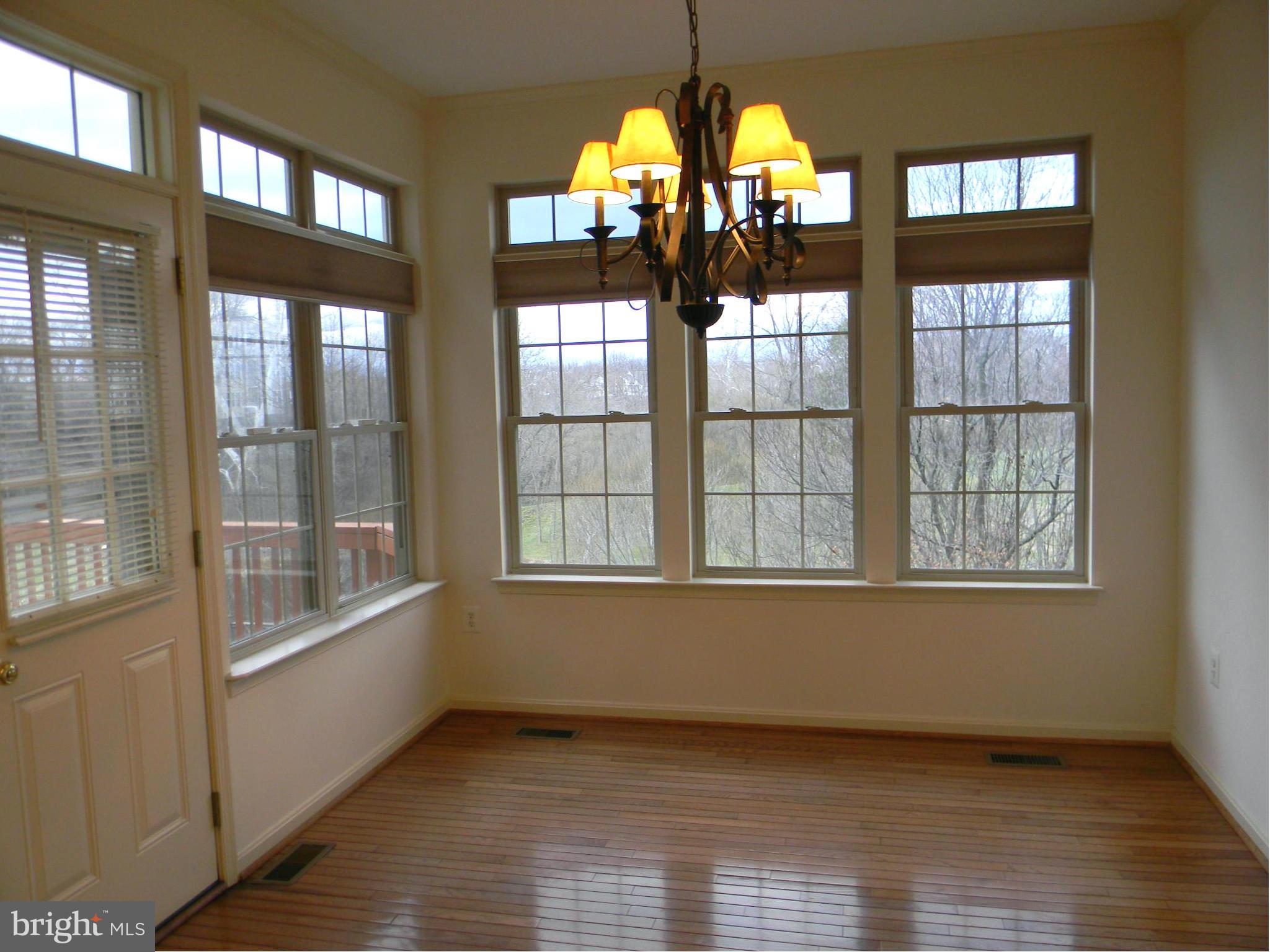 2442 Rippling Brook Road Frederick, MD 21701 - Photo 12 of 30 a view of an empty room with a window