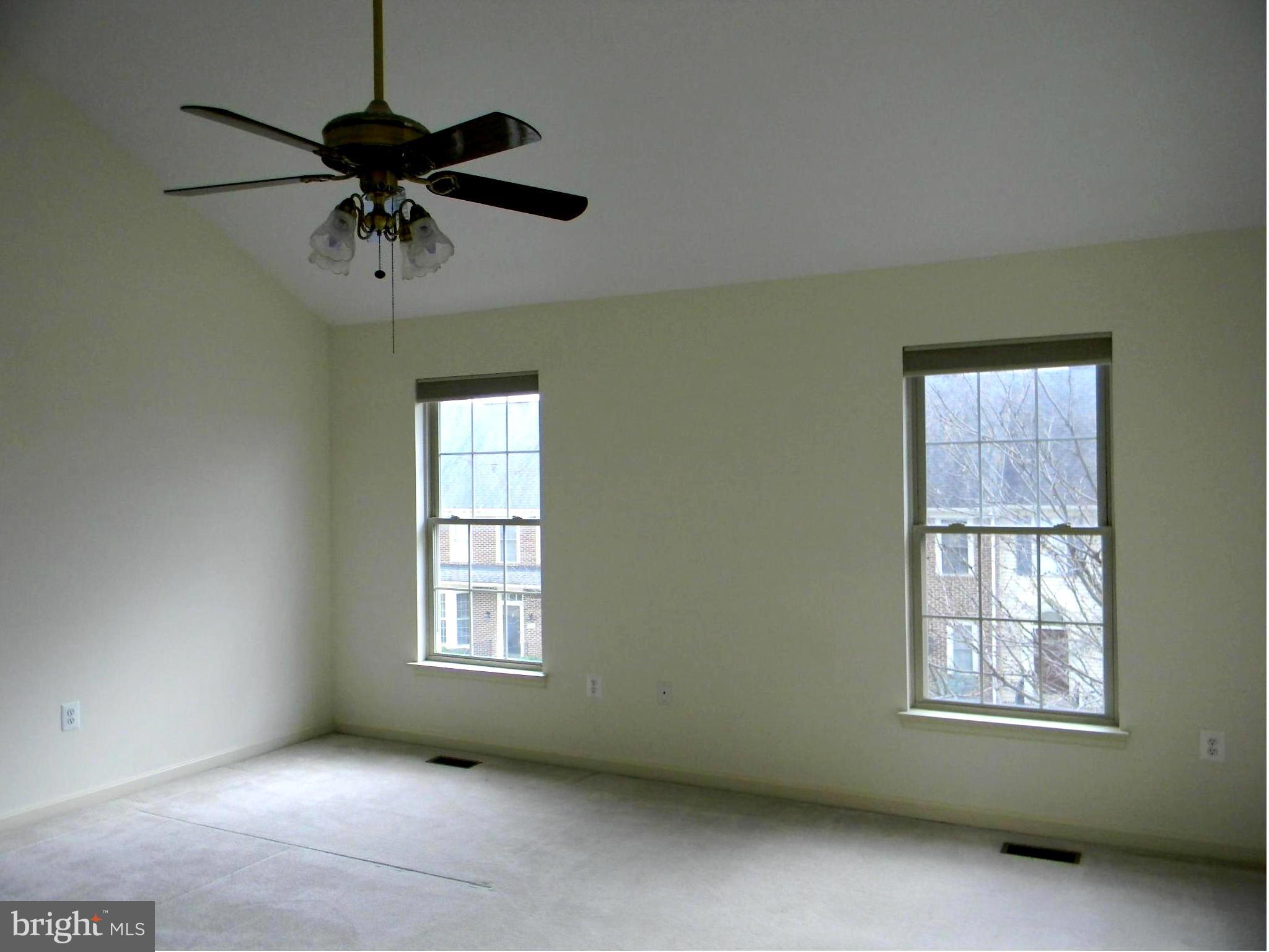 2442 Rippling Brook Road Frederick, MD 21701 - Photo 18 of 30 a view of an empty room with a window