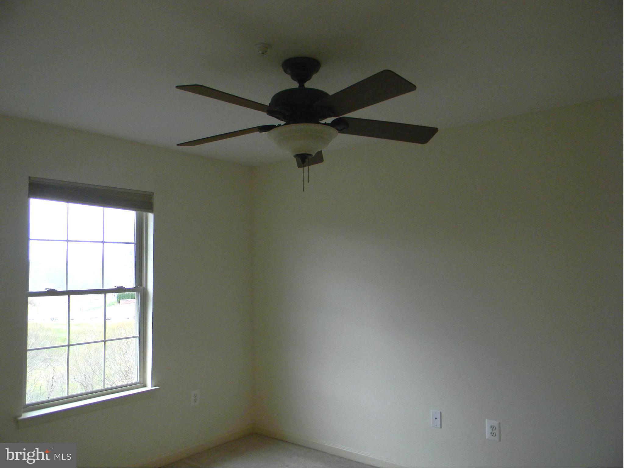 2442 Rippling Brook Road Frederick, MD 21701 - Photo 23 of 30 an empty room with a window