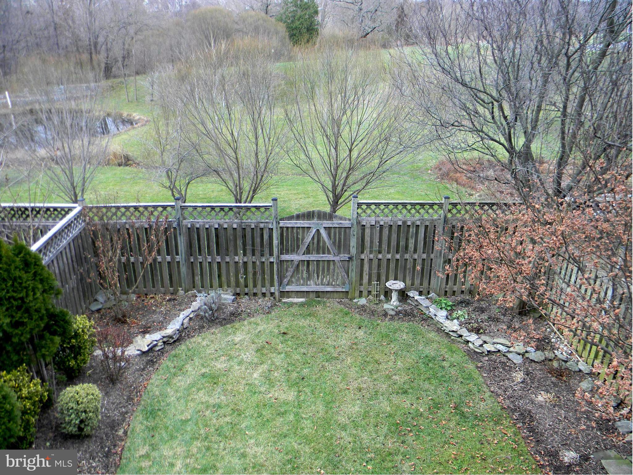 2442 Rippling Brook Road Frederick, MD 21701 - Photo 27 of 30 a garden with wooden fence