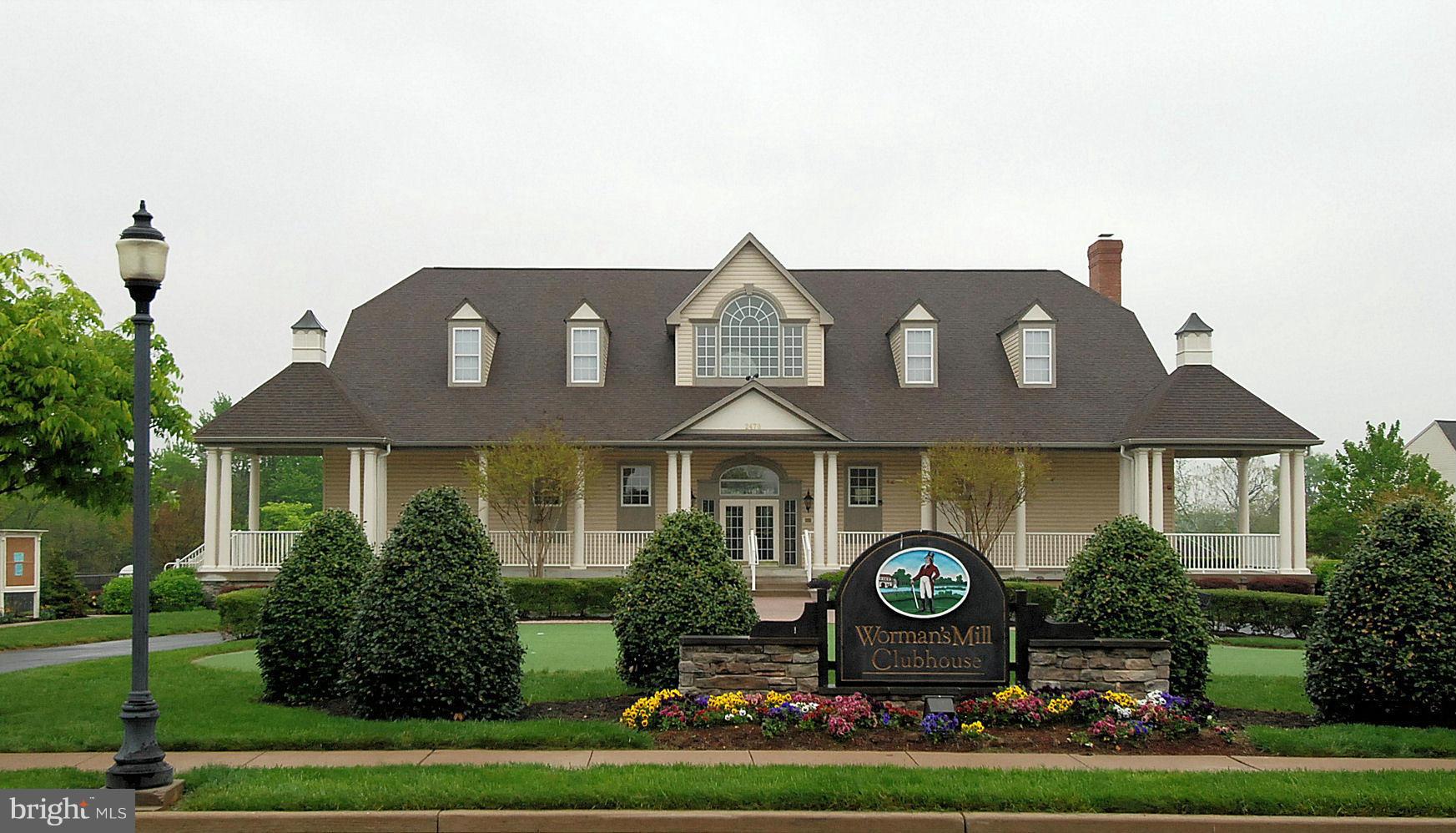 2442 Rippling Brook Road Frederick, MD 21701 - Photo 28 of 30 a front view of a house with garden