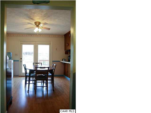 55 Amethyst Road Palmyra, VA 22963 - Photo 13 of 30 a view of a dining room with furniture and wooden floor