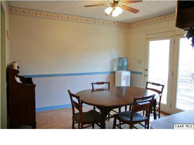55 Amethyst Road Palmyra, VA 22963 - Photo 14 of 30 a kitchen with a dining table and chairs