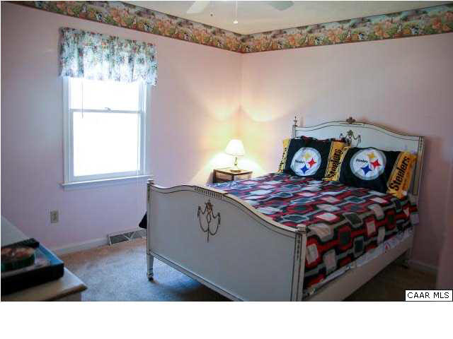 55 Amethyst Road Palmyra, VA 22963 - Photo 20 of 30 a living room with furniture and a window