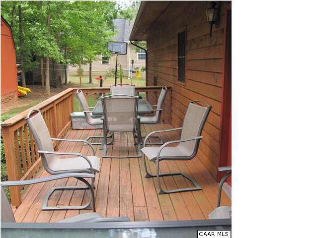 55 Amethyst Road Palmyra, VA 22963 - Photo 8 of 30 a view of a chairs and table in the balcony