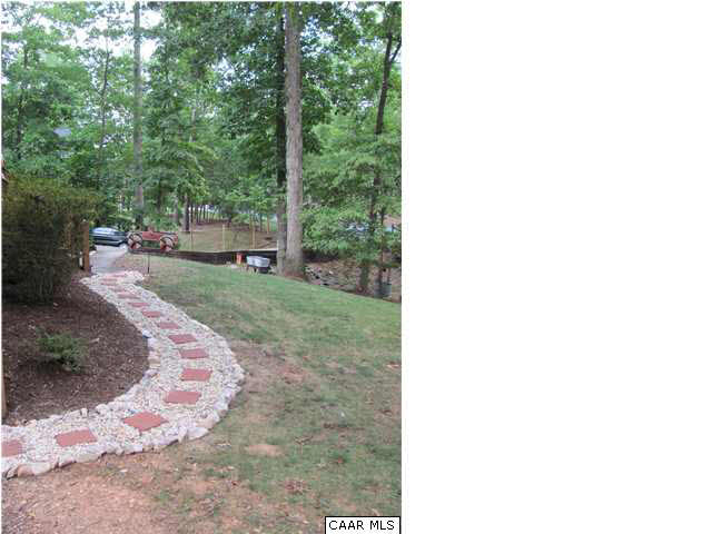 55 Amethyst Road Palmyra, VA 22963 - Photo 9 of 30 a view of a backyard with pathway